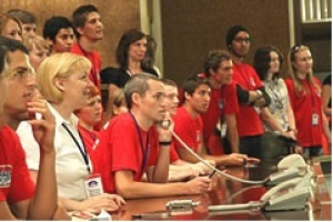 Graduate student, David Ladewig, speaking at the Mission Control Centre in Moscow, Russia, to Russian cosmonauts.